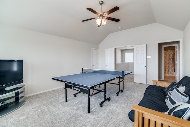 rec room with carpet floors, lofted ceiling, baseboards, and a ceiling fan