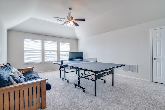 rec room featuring carpet, visible vents, lofted ceiling, and baseboards