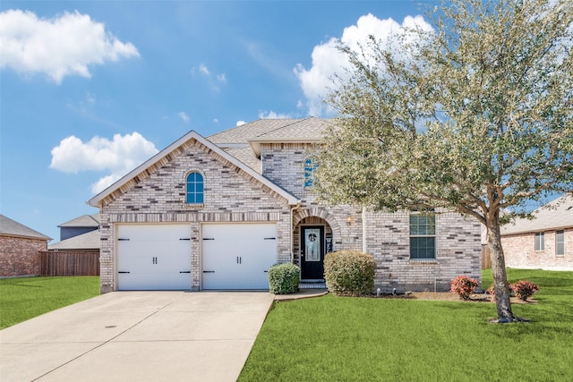 french country home featuring a garage, brick siding, fence, driveway, and a front lawn