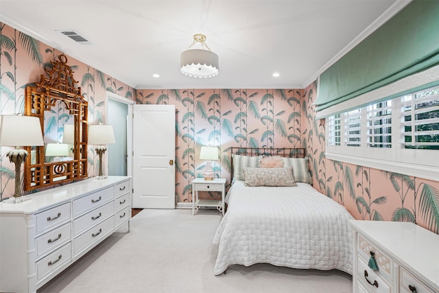 bedroom with carpet floors, visible vents, and wallpapered walls