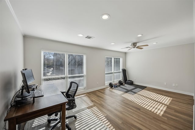 home office featuring visible vents, baseboards, wood finished floors, and recessed lighting