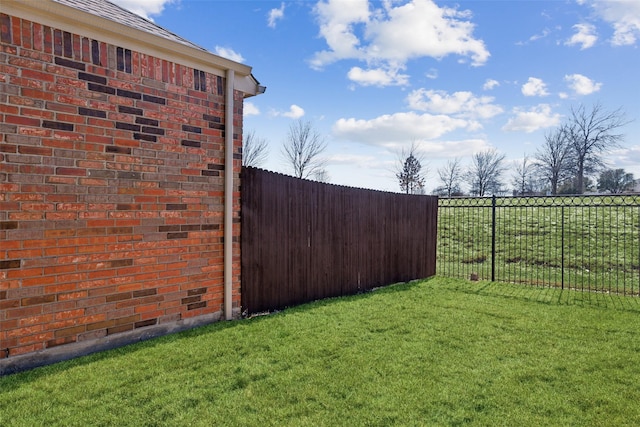 view of yard featuring a fenced backyard