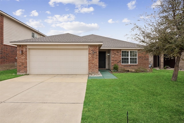 view of front facade with a shingled roof, concrete driveway, an attached garage, a front yard, and brick siding