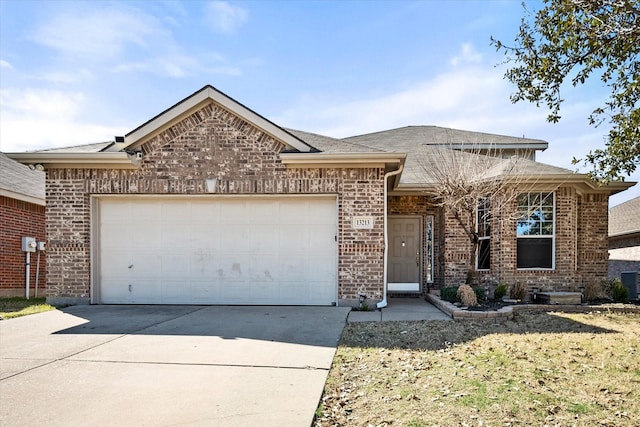 view of front facade with central AC unit, driveway, brick siding, and an attached garage