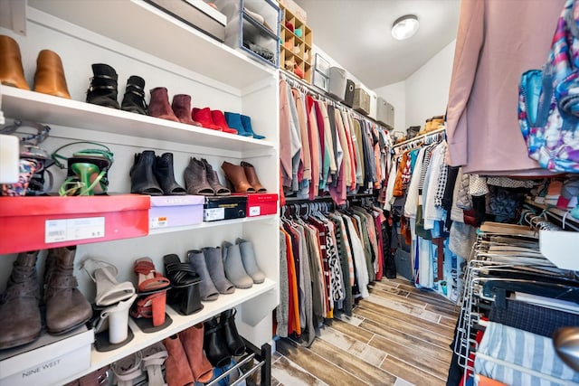 spacious closet featuring wood finish floors