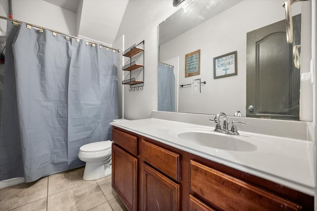 full bathroom featuring toilet, curtained shower, tile patterned flooring, and vanity