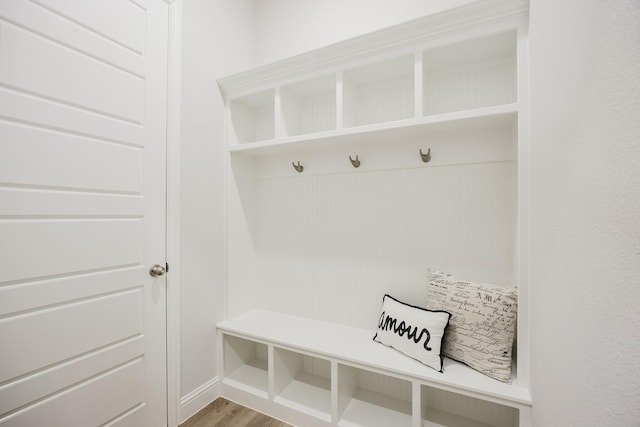 mudroom with wood finished floors