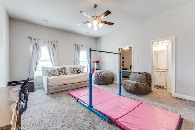 interior space featuring carpet, visible vents, ceiling fan, and baseboards