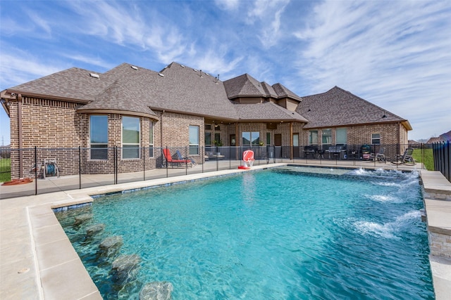 view of pool featuring a patio area, fence, and a fenced in pool