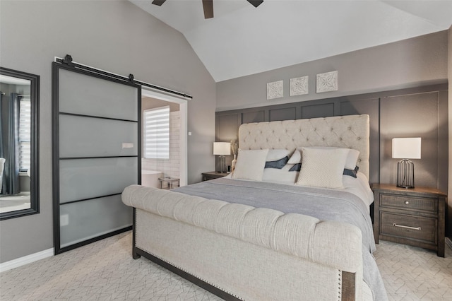 bedroom featuring a barn door, a ceiling fan, light carpet, vaulted ceiling, and baseboards