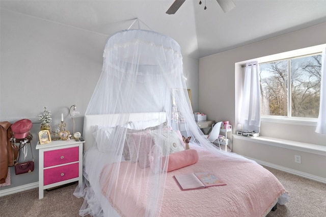 bedroom featuring lofted ceiling, ceiling fan, carpet flooring, and baseboards