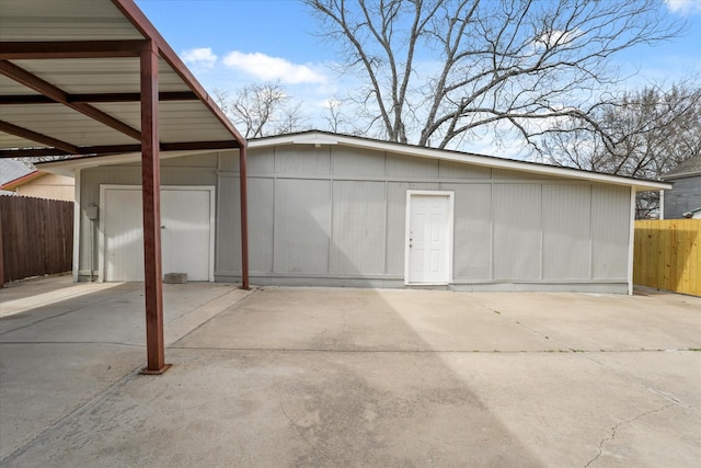 garage featuring fence