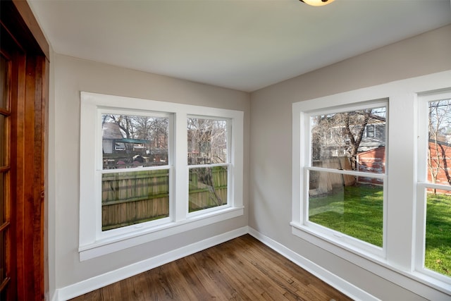 unfurnished sunroom with a healthy amount of sunlight