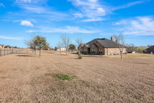 view of yard with fence