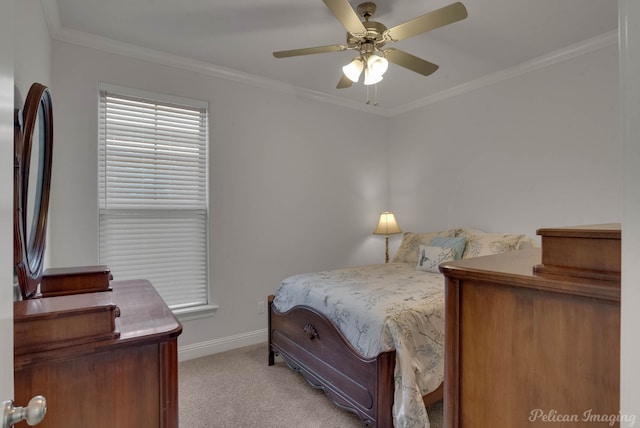 bedroom featuring ornamental molding, light colored carpet, ceiling fan, and baseboards