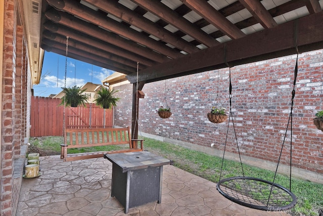 view of patio with fence