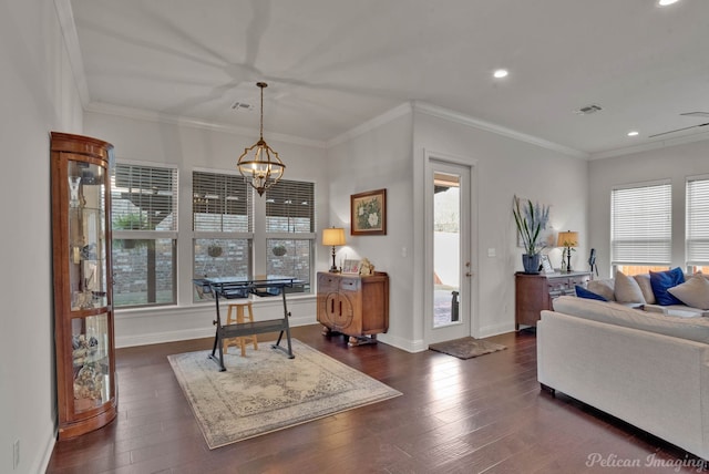 office area featuring ornamental molding, dark wood-type flooring, visible vents, and a healthy amount of sunlight