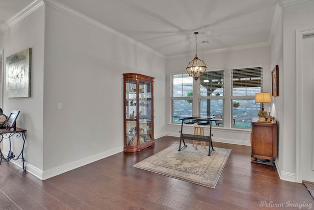 interior space featuring visible vents, a chandelier, dark wood finished floors, and ornamental molding