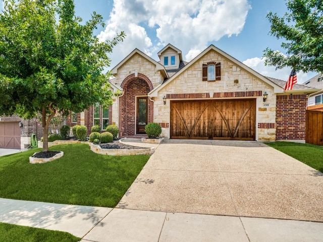 view of front of property featuring brick siding, concrete driveway, an attached garage, a front yard, and stone siding