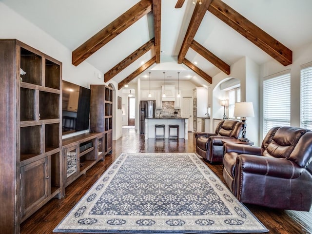 living room with vaulted ceiling and dark wood-style floors