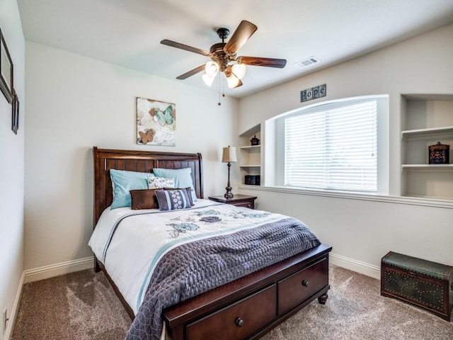 bedroom featuring carpet floors, a ceiling fan, visible vents, and baseboards