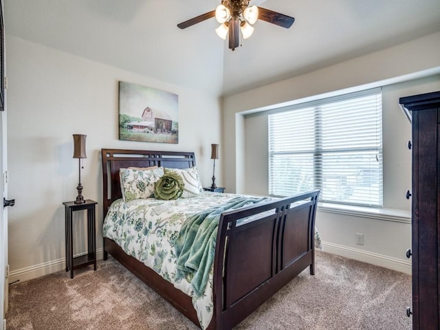 bedroom featuring carpet, baseboards, and ceiling fan