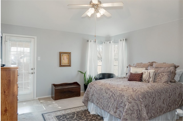 bedroom with carpet floors, baseboards, and a ceiling fan