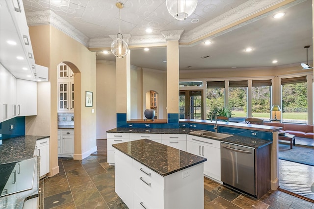 885 Vz County Road 2513, Canton, TX 75103 - kitchen with dishwasher, crown molding, a sink, stone tile flooring, and white cabinetry