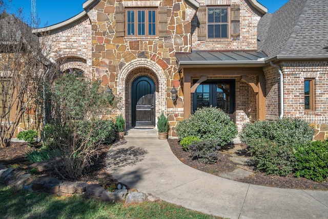 885 Vz County Road 2513, Canton, TX 75103 - entrance to property featuring brick siding, roof with shingles, a standing seam roof, and stone siding