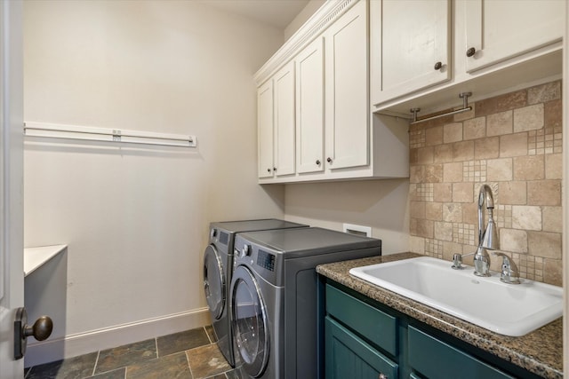 885 Vz County Road 2513, Canton, TX 75103 - laundry room with cabinet space, washing machine and clothes dryer, baseboards, and dark stone finish flooring