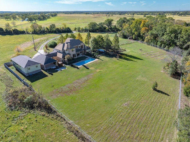 birds eye view of property featuring a rural view