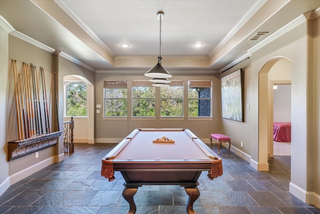 885 Vz County Road 2513, Canton, TX 75103 - game room with arched walkways, stone tile floors, a tray ceiling, baseboards, and ornamental molding