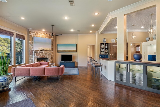 885 Vz County Road 2513, Canton, TX 75103 - living area with a ceiling fan, wood finished floors, ornamental molding, recessed lighting, and a fireplace