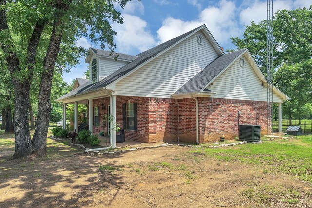2113 Vz County Road 3710, Edgewood, TX 75117 - view of front of house with brick siding and covered porch