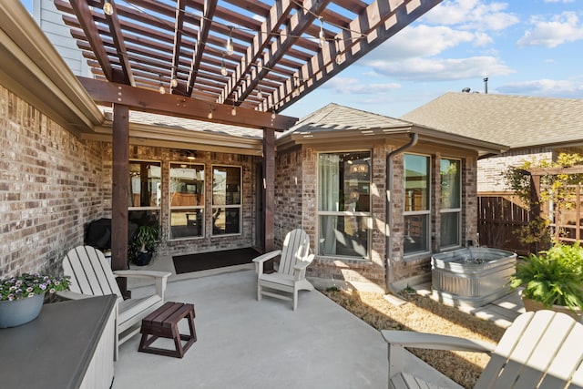 view of patio featuring fence and a pergola