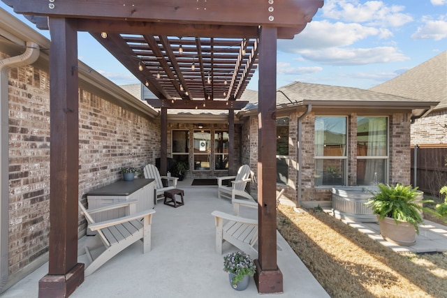 view of patio featuring a pergola