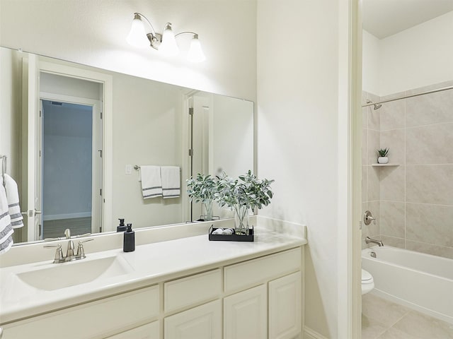 full bath with toilet, bathtub / shower combination, vanity, and tile patterned floors