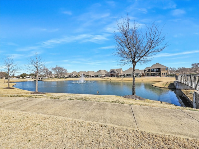 view of water feature with a residential view