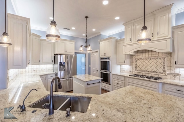 kitchen with light stone counters, visible vents, appliances with stainless steel finishes, and ornamental molding