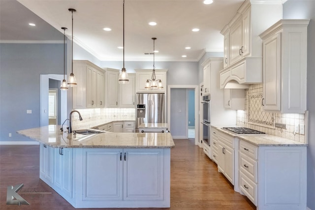 kitchen with a sink, dark wood-style floors, light stone countertops, and stainless steel appliances