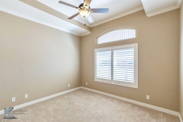 empty room with crown molding, carpet flooring, baseboards, and a wealth of natural light