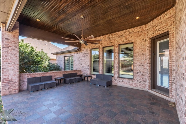 view of patio featuring an outdoor hangout area and a ceiling fan