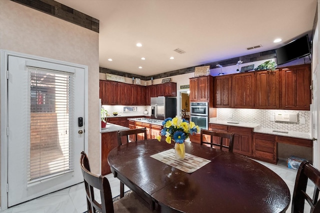 dining area with marble finish floor, visible vents, and recessed lighting