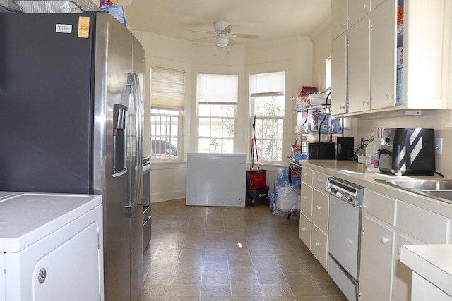 kitchen with washer / dryer, dishwasher, ceiling fan, light countertops, and stainless steel refrigerator with ice dispenser