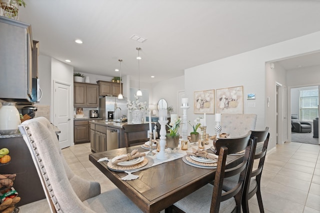 dining room featuring light tile patterned floors, baseboards, visible vents, and recessed lighting