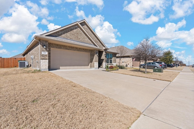 ranch-style home featuring brick siding, central AC, fence, a garage, and driveway