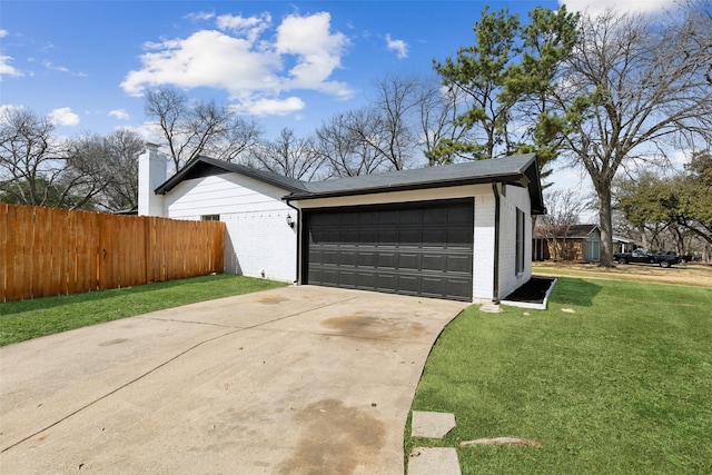 garage featuring fence