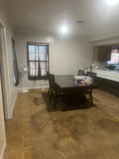 dining room featuring baseboards