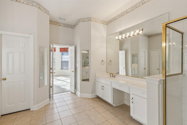 bathroom with tile patterned flooring, visible vents, vanity, and an enclosed shower