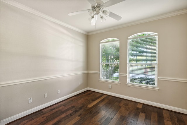 unfurnished room featuring a wealth of natural light, ornamental molding, and dark wood-type flooring